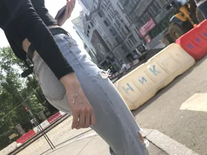 Awesome booty in ripped tight jeans street photos