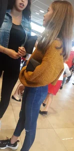 Perfect ass in tight blue jeans with a phone in back pocket at the store creepshots