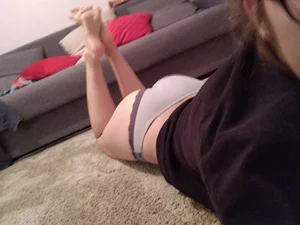 Teen Lying on Her Tummy in Panties and Showing Legs and Bare Feet Home Selfie