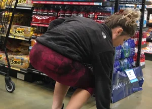 Milf grocery shopping in red leggings with a great ass