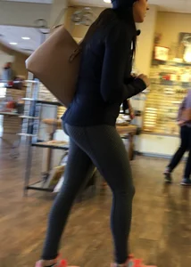 Brunette jewelry shopping in leggings with a nice ass
