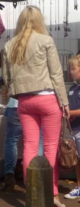 Booties of street candid girls wearing tight jeans