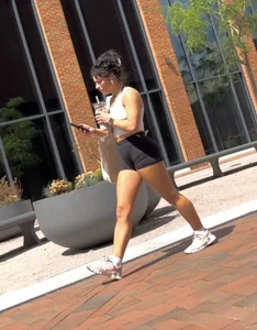Curly Campus Brunette with amazing Bubble Butt in Tight Shorts (oc)
