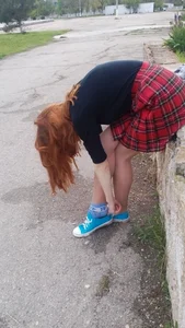 Teen JB with Skinny Legs Adjusting Her Shoe