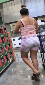 Thick Latina babe with a nice ass in tight patterned shorts