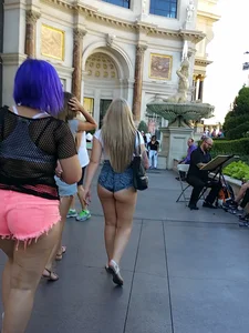 Big booty blonde showing a ton of her ass cheeks in shorts