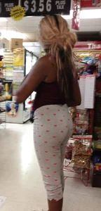 Black girl with a sexy ass in tight grey heart leggings