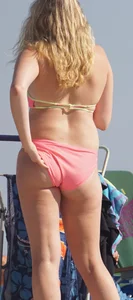 Thick blonde bikini babe on the beach