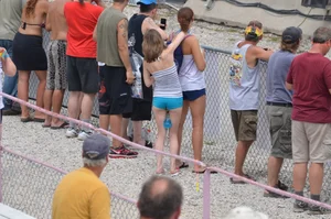Skinny babe with a cute little ass in tiny blue shorts