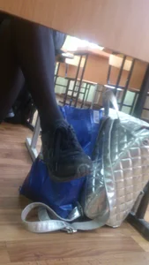 Candid College Girl's Legs in Black Pantyhose And Feet in Sneakers Creepshots Gallery in a Classroom