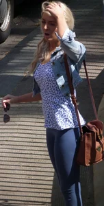 Hot blonde girl in tight blue leggings with nice ass