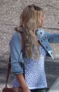 Hot blonde girl in tight blue leggings with nice ass