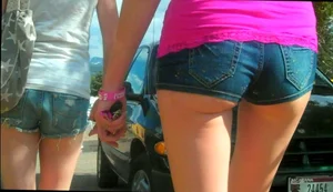 Skinny babe in denim shorts with a nice gap showing ass cheeks