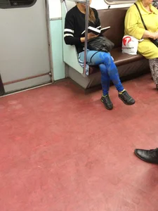 Girl in Blue Spandex Tights Reading in the Subway Train Candid