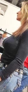 Milf in jeans shopping with big tits