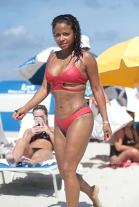 Christina Milian in red bikini in Miami with hard nipples