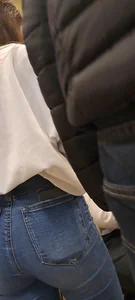 Girl is showing her blue jeans