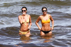 Frankie Bridge nip slips in a bikini on the beach