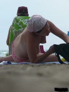 Sexy candid topless and nude beach girls