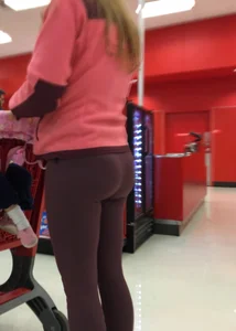 Target milf with a decent ass in maroon leggings