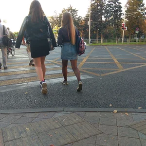 Girl in a Skirt Street Legs Closeup