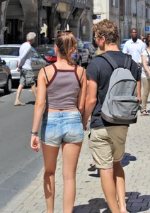 Beautiful teen out with boyfriend in short jean shorts