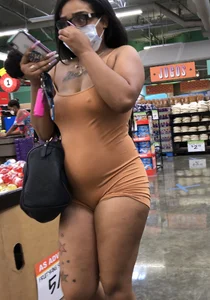 Latina with hard nipples and a big booty in tight spandex shorts outfit