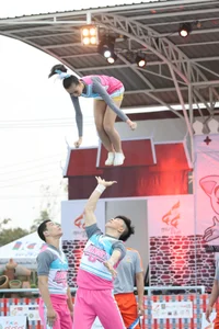 Bunch of athletic Thai cheerleaders at a competition
