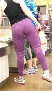 Thick Blonde in purple leggings