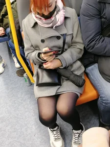 Cute Redhead in Black Pantyhose Sitting in Public Train Candid Photos
