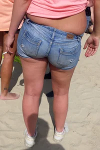 Sexy booty in shorts beach creepshot