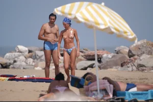 Girls on a nude beach in Bibione, Italy