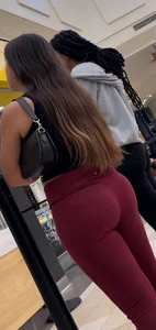 Cute chick in maroon leggings