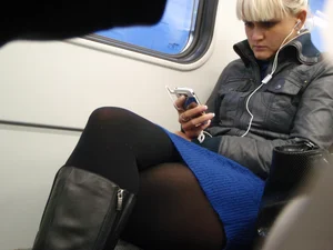 Sexy girls in skirts, stockings and upskirts on the train
