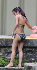 Sexy brunette milf in a bikini with a great body, nice ass and some camel toe