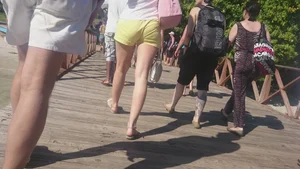 Milf in yellow shorts with vpl and a wedgie