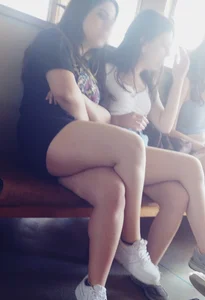 A Group of Candid Teens in Shorts Sitting in a Public Train Creepshots