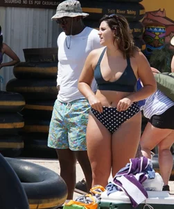 Girls in bikinis getting ready for tubing
