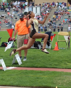 Candid track girls and runner