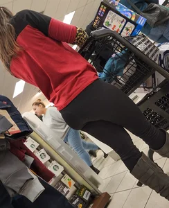Brunette with a tight butt, boots, and a VPL