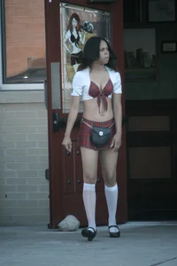 Two sexy Tilted Kilt employees showing cleavage and cheeks