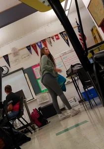 College Girl Pulling Up Her Grey Tights Photos