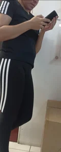 Beautiful blonde girl with amazing big ass in black adidas leggings, with a small camel toe [OC]