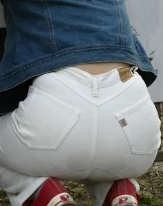 Girl Squatting in Tight White Jeans Ass Closeup