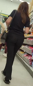 Brunette babe in black flares