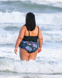 Extra thick girl at the beach in a bikini