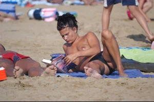 Girls on a nude beach in Bibione, Italy