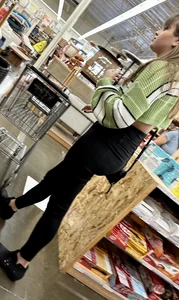 Great ass on this cutie with bangs, bending over and squatting down