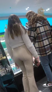 Girl in tight beige pant