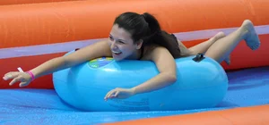Beautiful brunette tube girl in black bikini